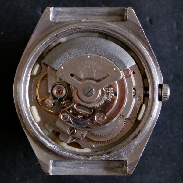 Thumbnail image of Seiko movement 6309A. This one has corrosion on the weight of the rotor.
